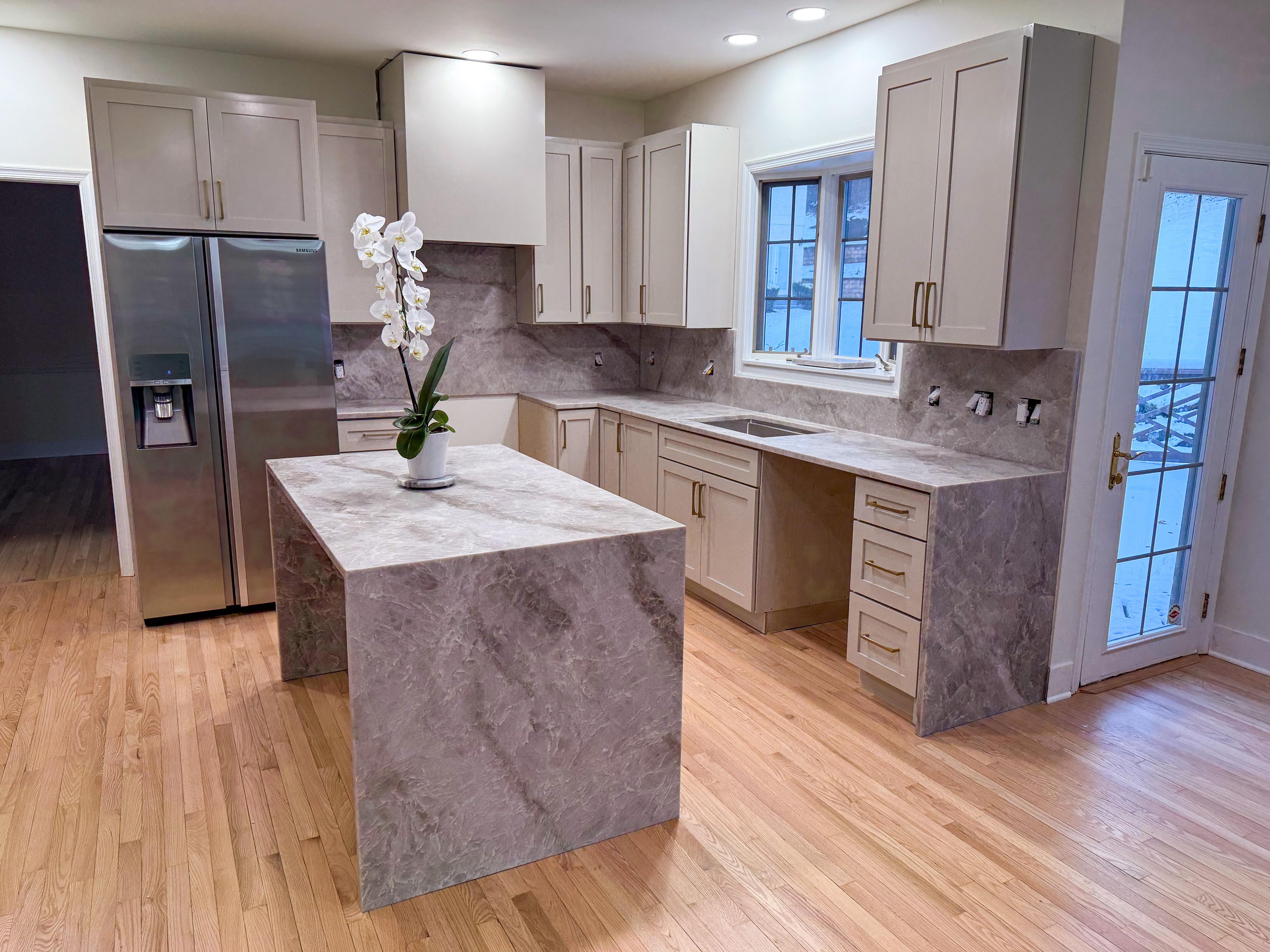 GWJ Granite kitchen — quartz countertops and custom cabinetry
